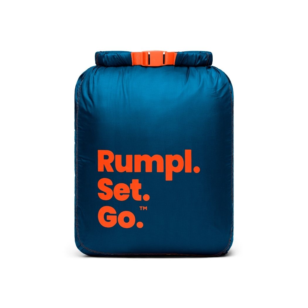 Rumpl The Camp Pillow - Midnight Retro Stripes The Camp Pillow - Midnight Retro Stripes | Rumpl Blankets For Everywhere Camp Pillow